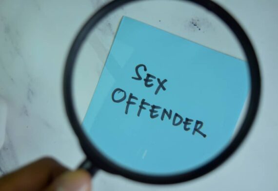 Sex offender written on sticky note.